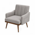 Sillón tapizado en tela gris claro con reposabrazos y patas de madera de caucho natural 70 x 75 x 85 cm